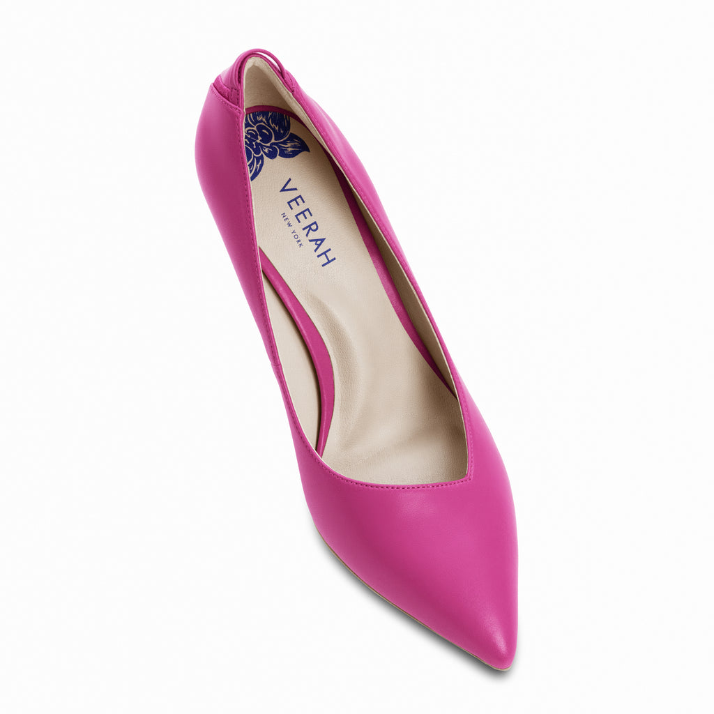 Hot pink pointed toe pumps in vegan leather