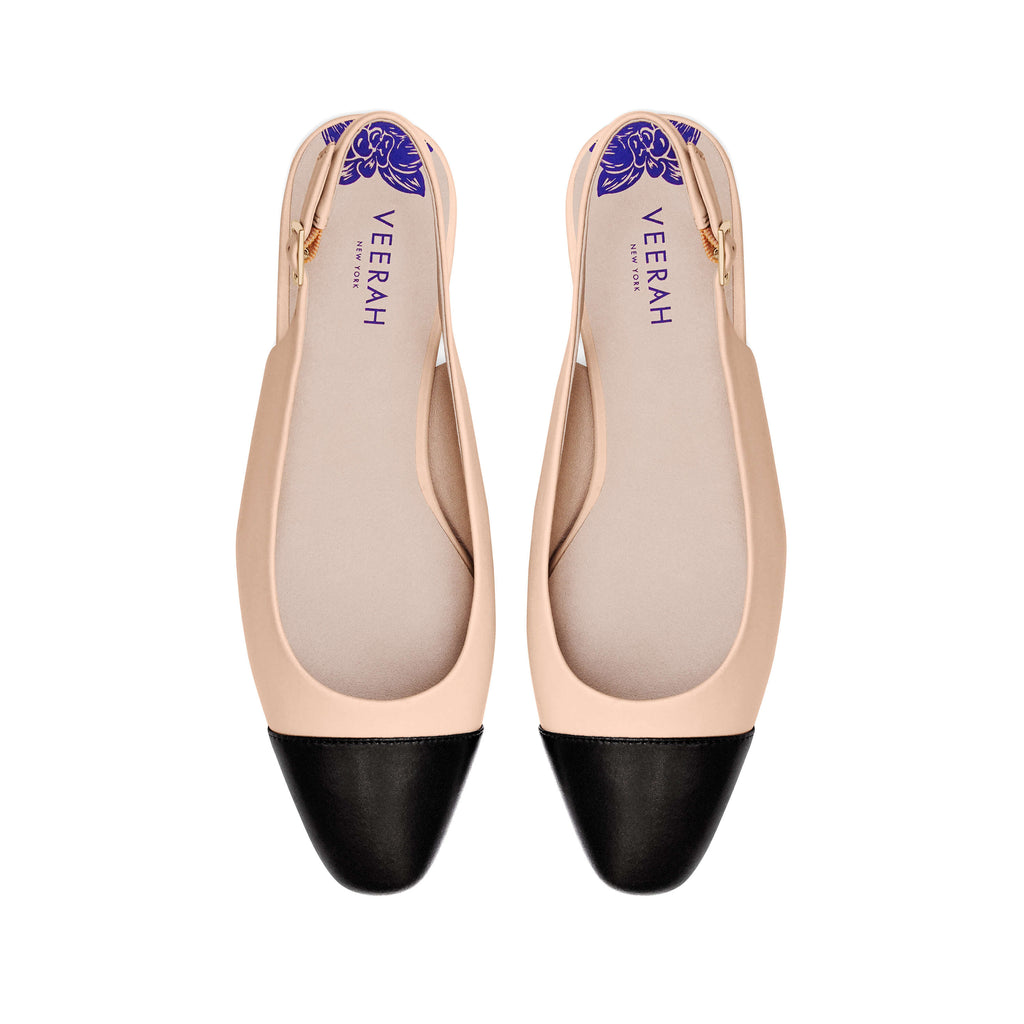 Elegant beige slingback vegan flats with black cap toe and low heel – sophisticated and versatile women's vegan shoes for work, casual, or formal wear.